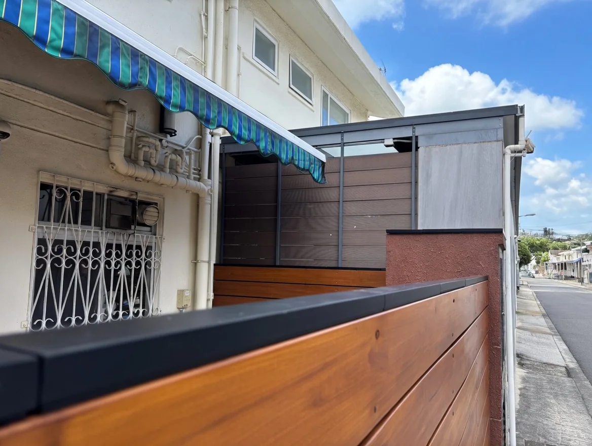 Completed Apeiron Guard fence-top sensors on a timber residential boundary