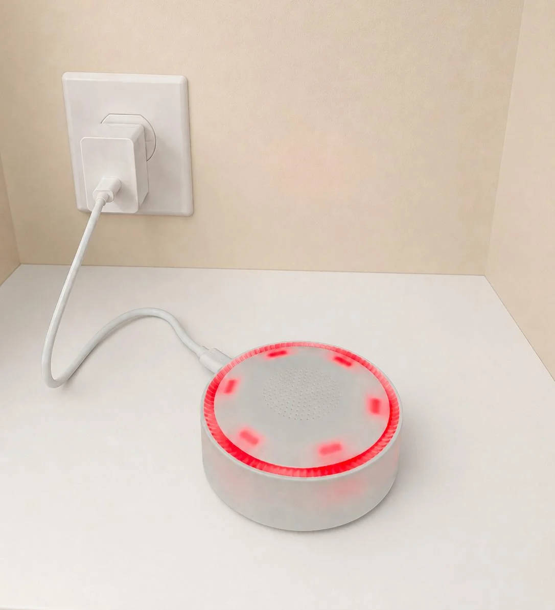 Powered Mini Alarm Hub with its indicator light flashing red