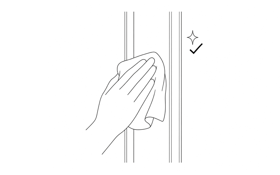 Hand cleaning the Window Sensor mounting surfaces on the window frame with a cloth